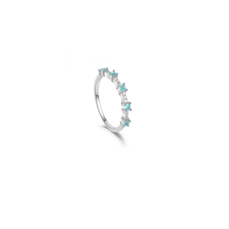 Anillo de plata rodiada y circonitas con garras y piedras color azul PROMOJOYA